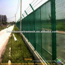 Steel plate anti - glare network for highway fence
